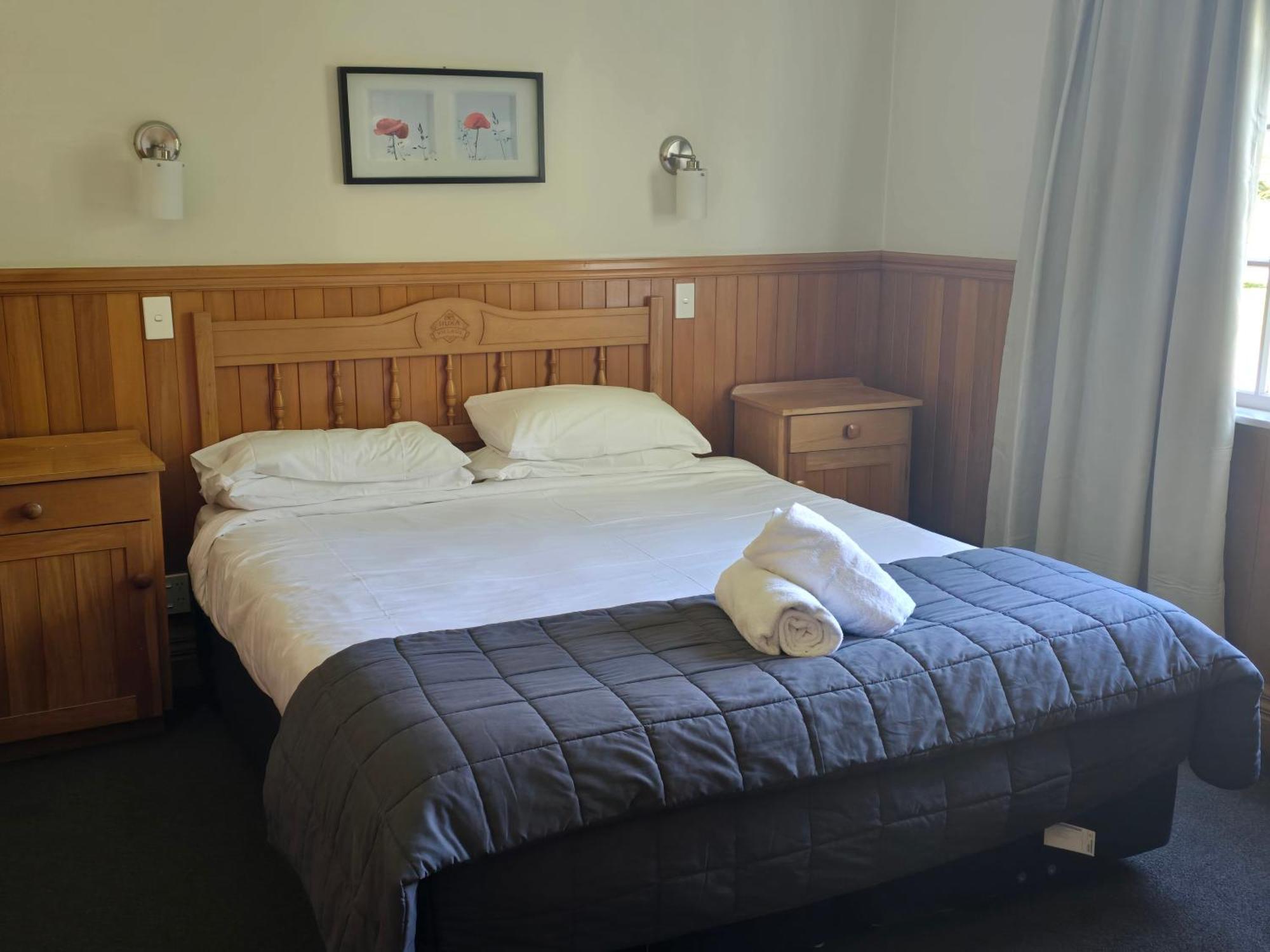 胡卡瀑布品质度假村 陶波 外观 照片 A bedroom at the hotel